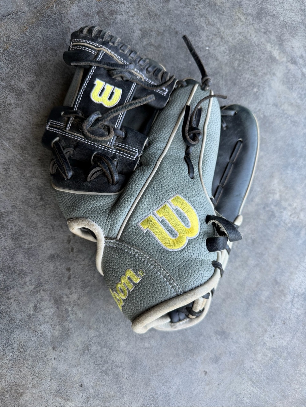 Wilson Gray and Black Baseball Glove with Yellow Logo